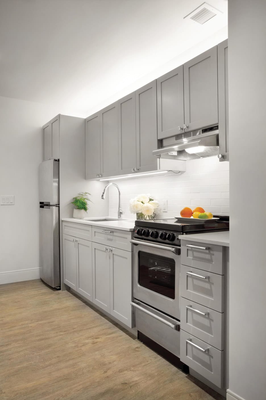 Brooklyn Heights Independent & Assisted Living Photo Gallery - a close of the stainless steel appliances featured throughout the Watermark at Brooklyn Heights with light cabinetry and white subway tile backsplash 
