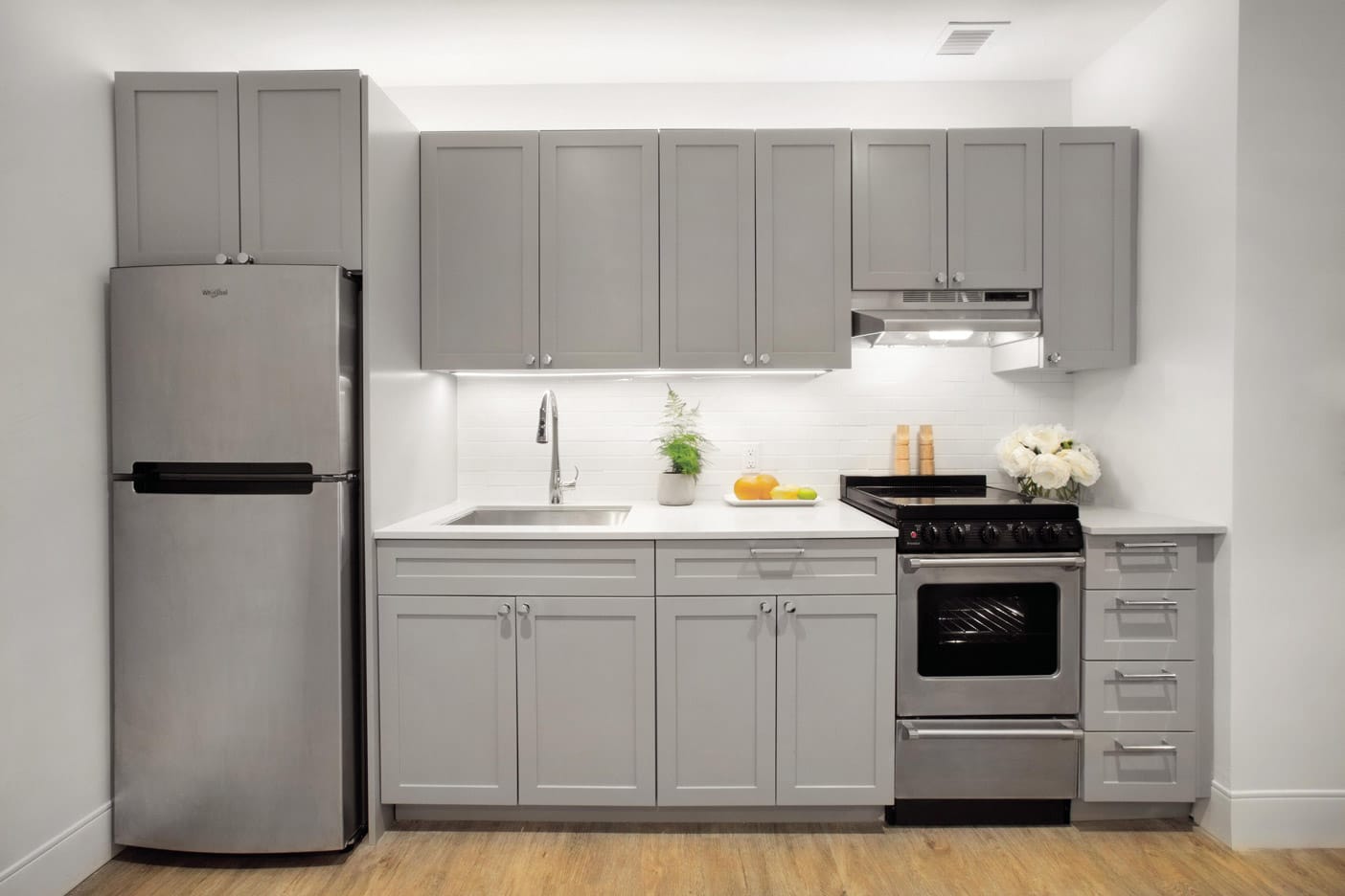 Brooklyn Heights Independent & Assisted Living Photo Gallery - a close of the stainless steel appliances featured throughout the Watermark at Brooklyn Heights with light cabinetry and white subway tile backsplash 