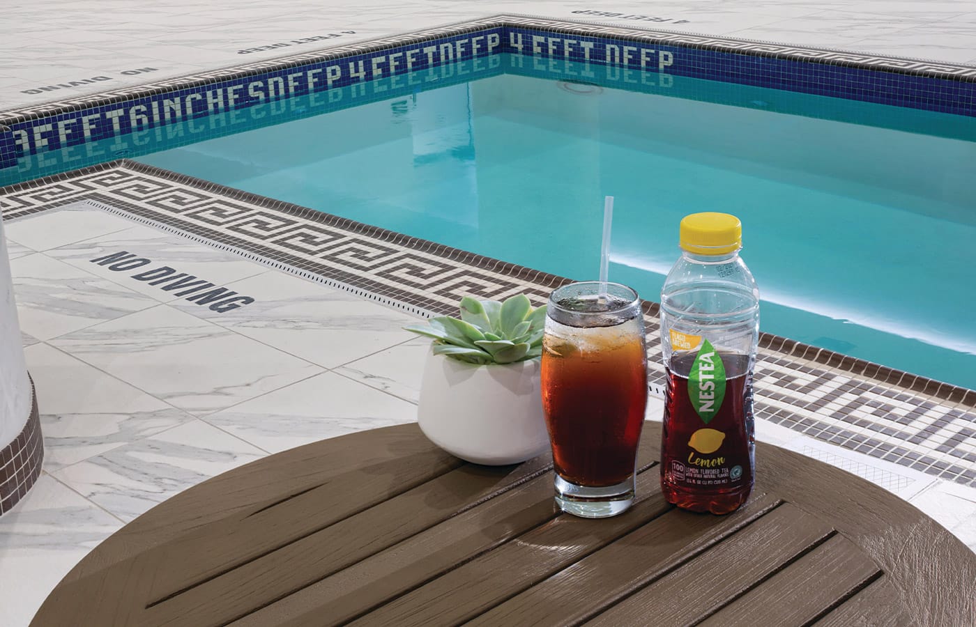 drink on a table poolside 