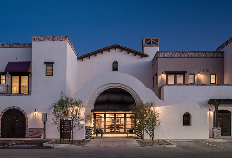 exterior shot of a watermark property after sunset