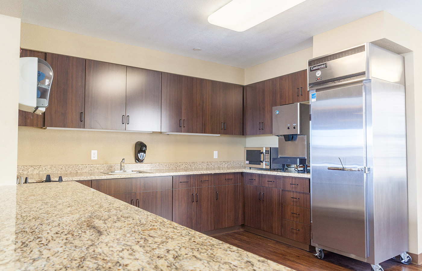 The kitchen inside one of the apartment. 