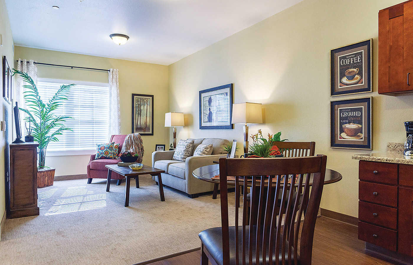 Living room in one of the apartment at The  Caliche Senior Living.