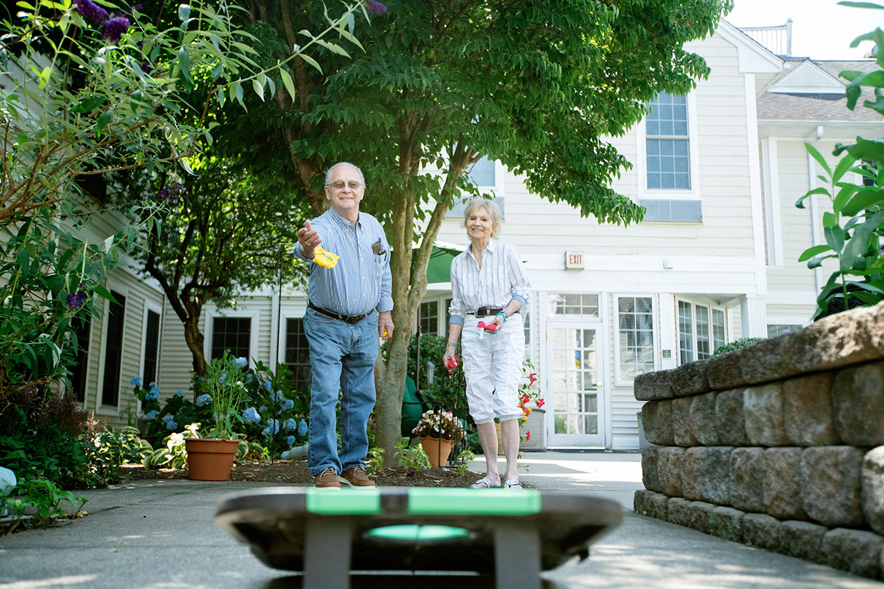 Residents playing games in the courtyard