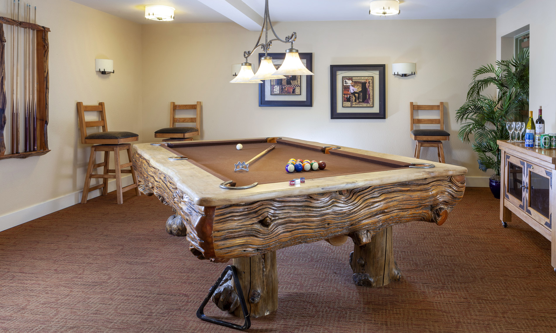 A beautifully wooden carved pool table