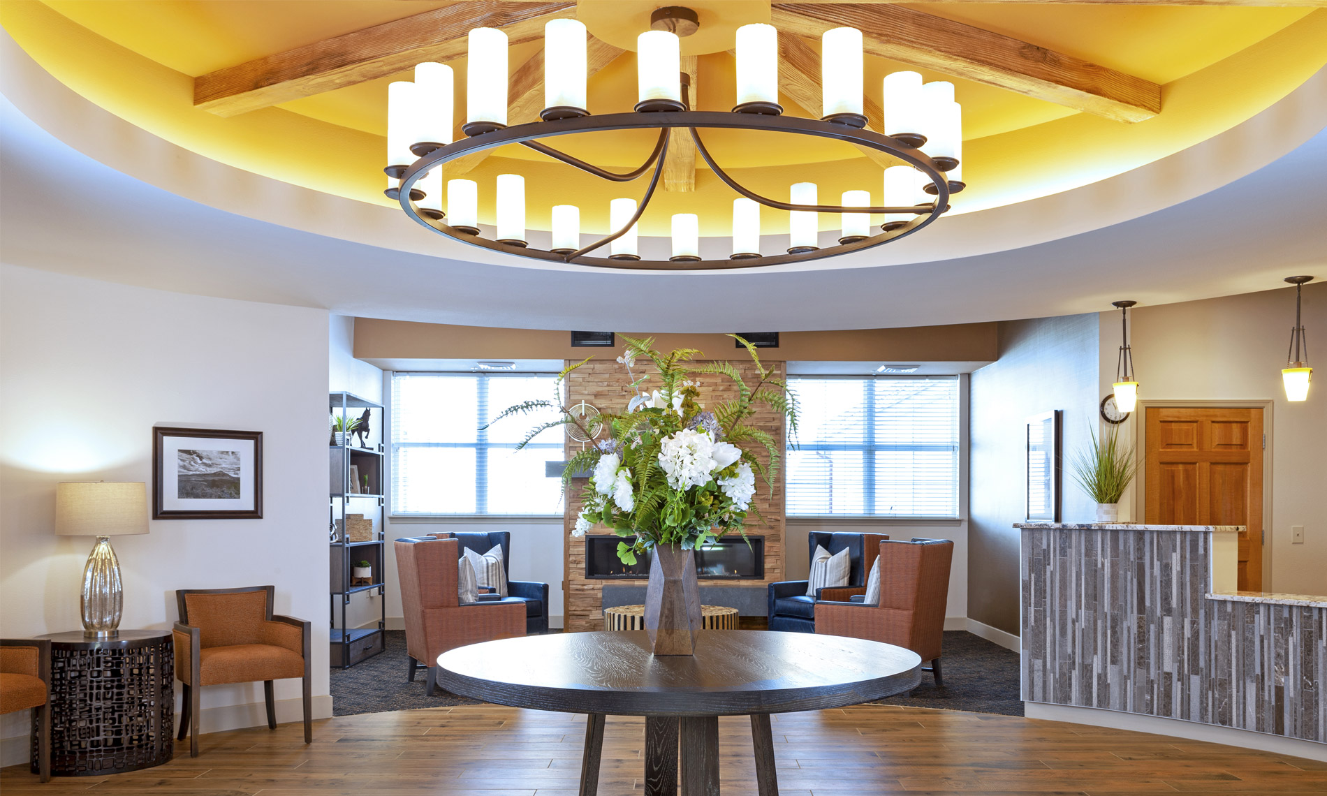 Vast Hall with beautiful Chandelier and cozy chair