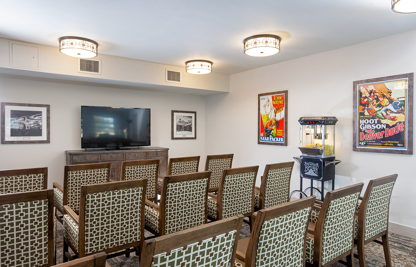 Rows of chair facing a TV screen 
