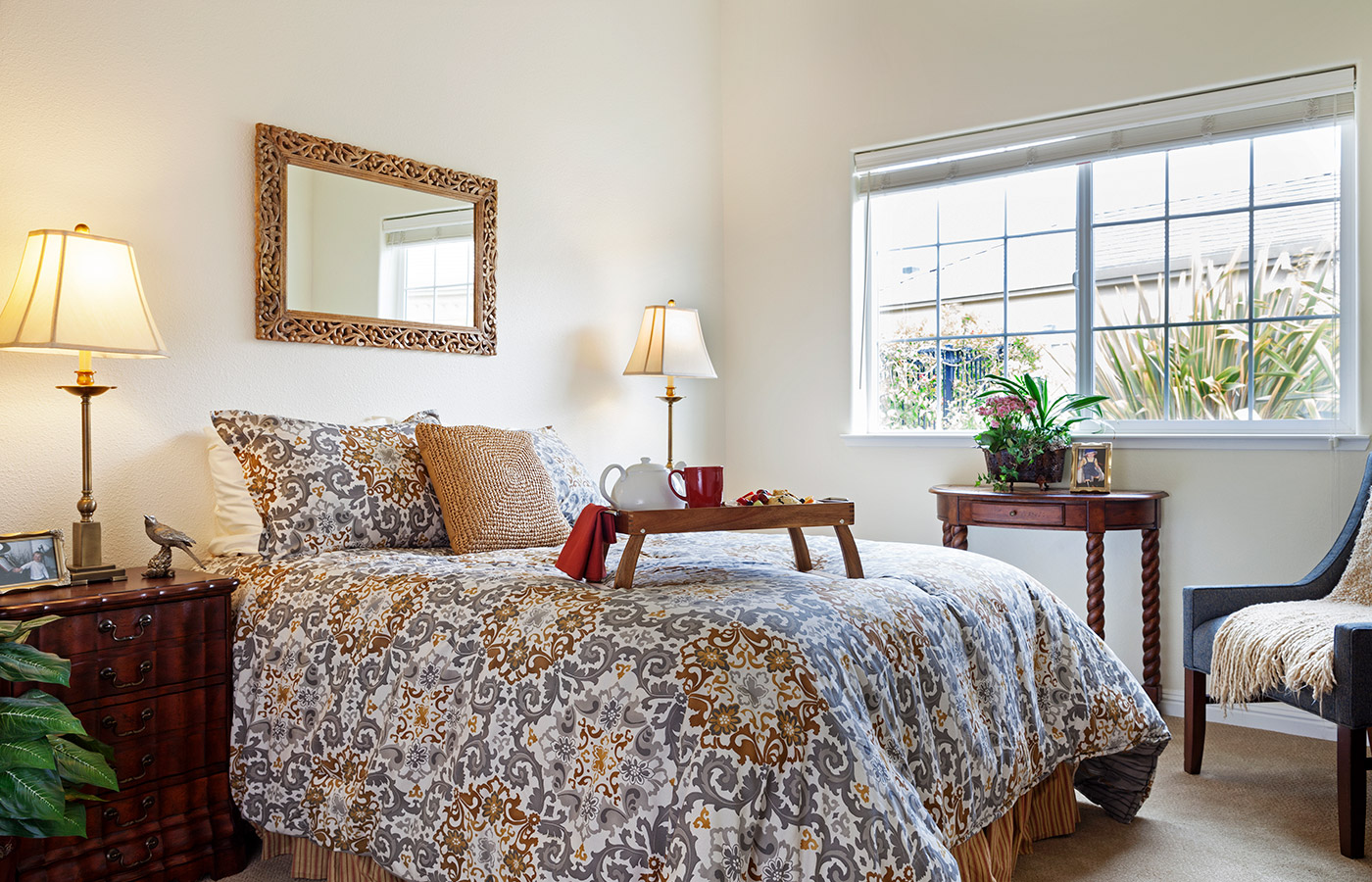 A bedroom in one of the apartment of the residence