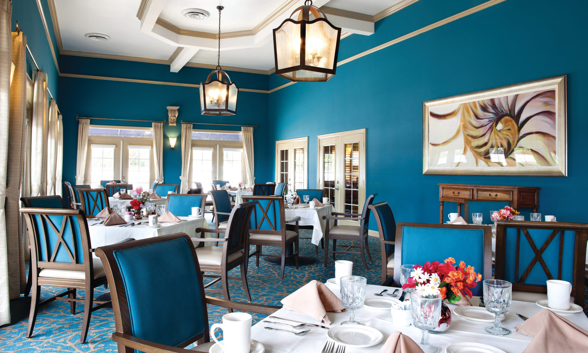 Dining Room with matching setup and silver ware