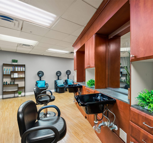 Hair dresser chairs facing mirrors