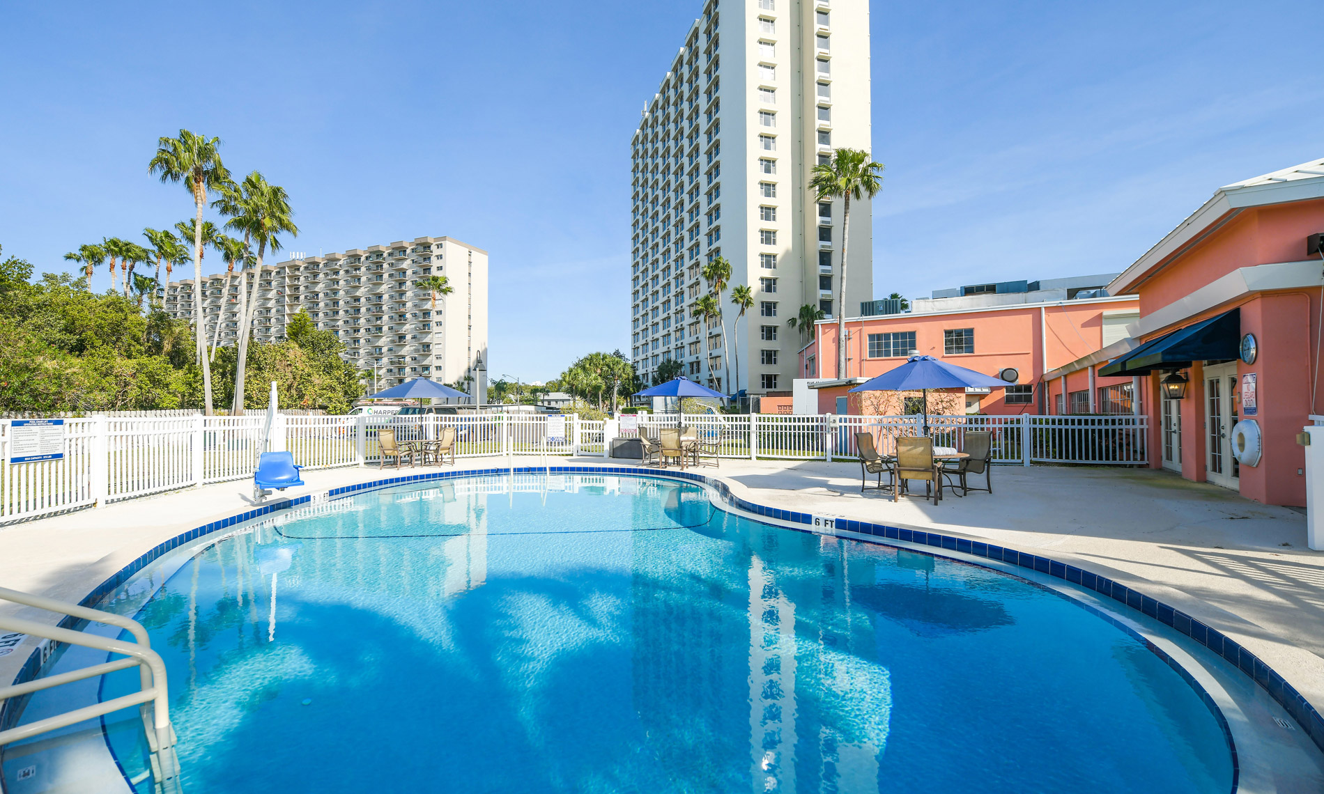 outdoor pool with the buildings in the background