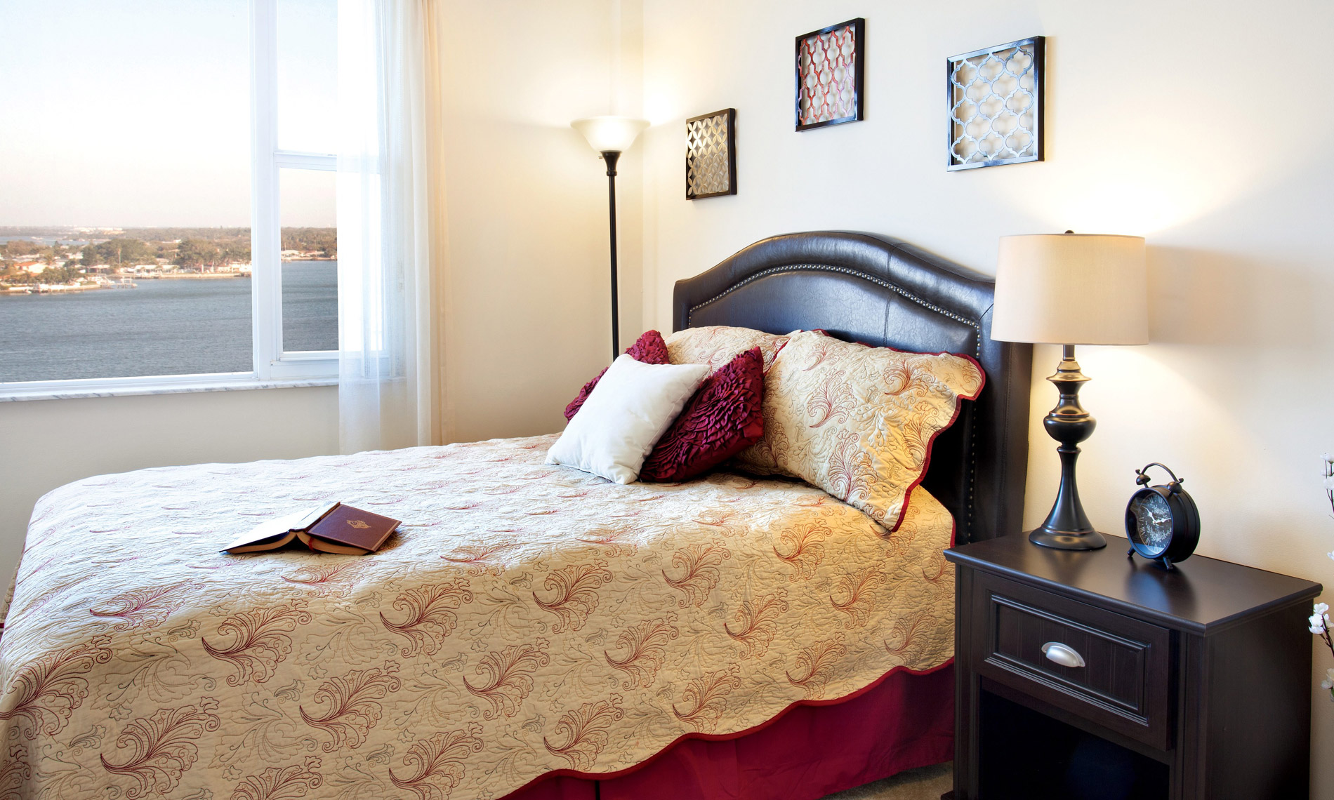 Modest bedroom with bright window