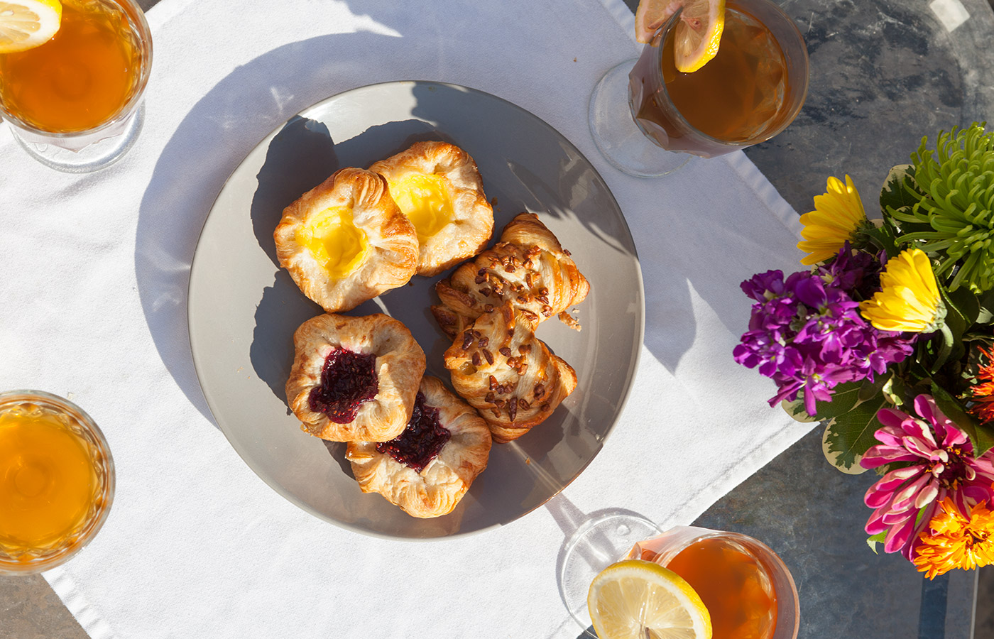 Table with drinks and good looking pastries