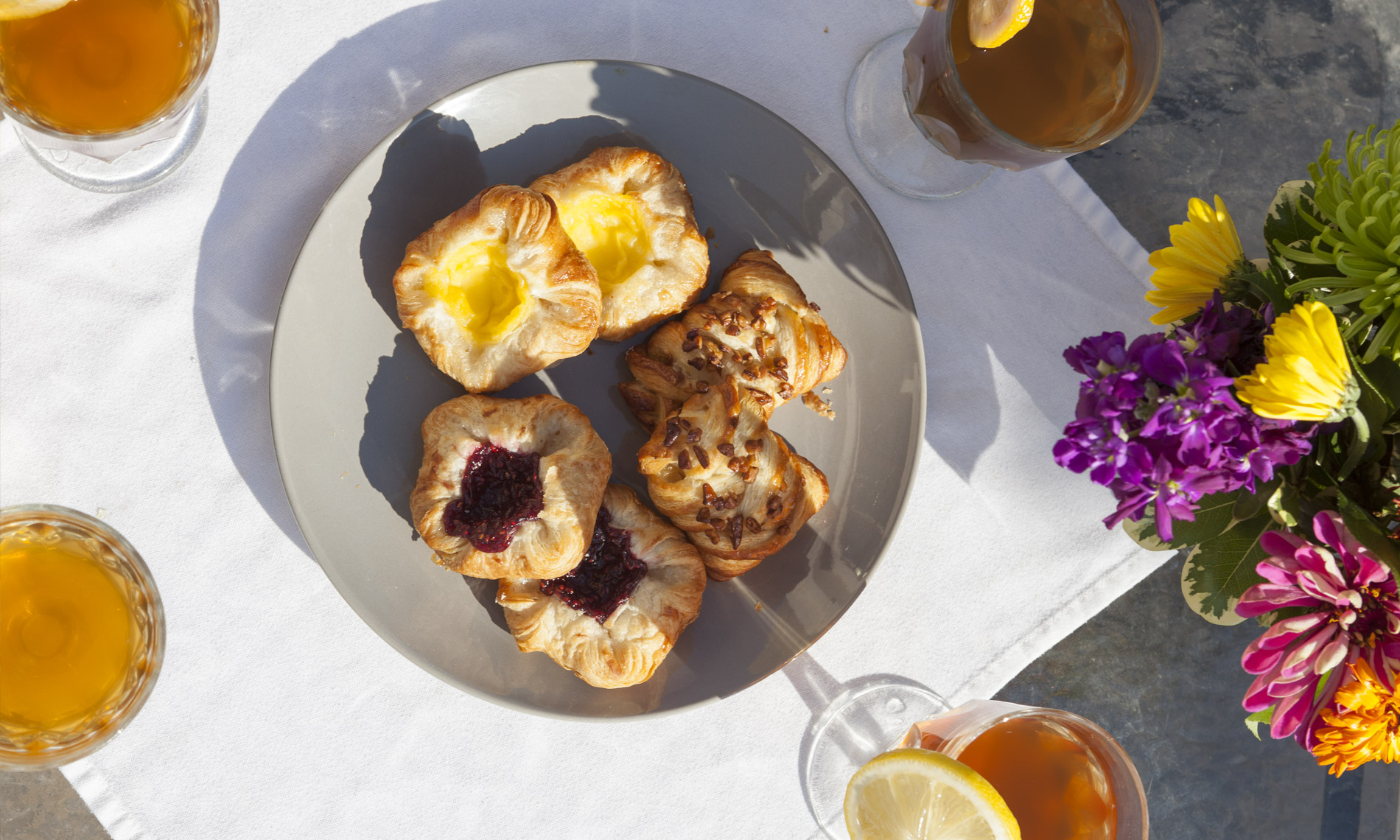 Table with drinks and good looking pastries