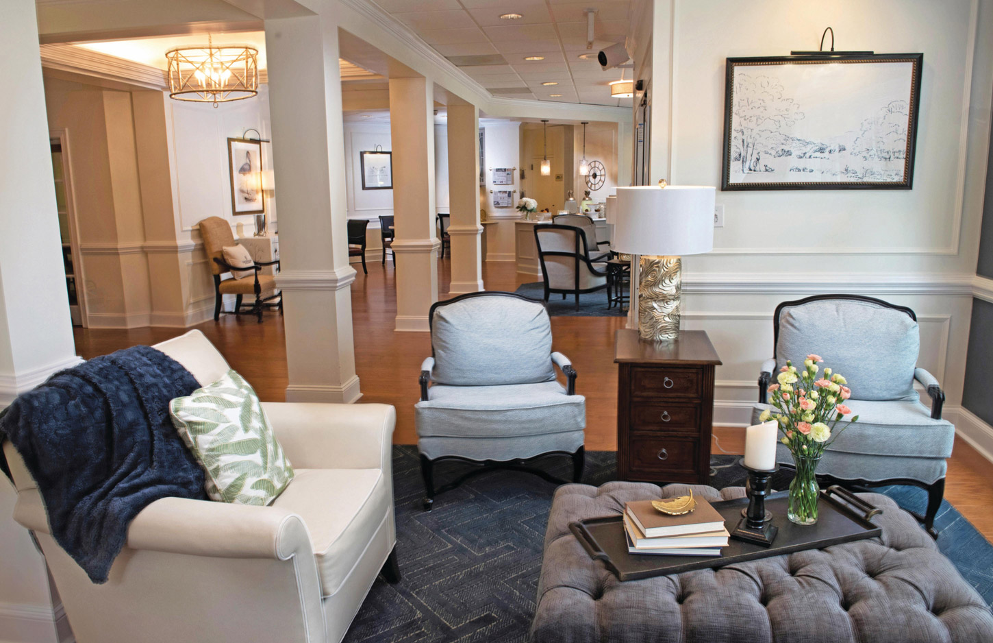 A seating area in the Parlour at The Fountains at Albemarle showcasing a larger area in the background