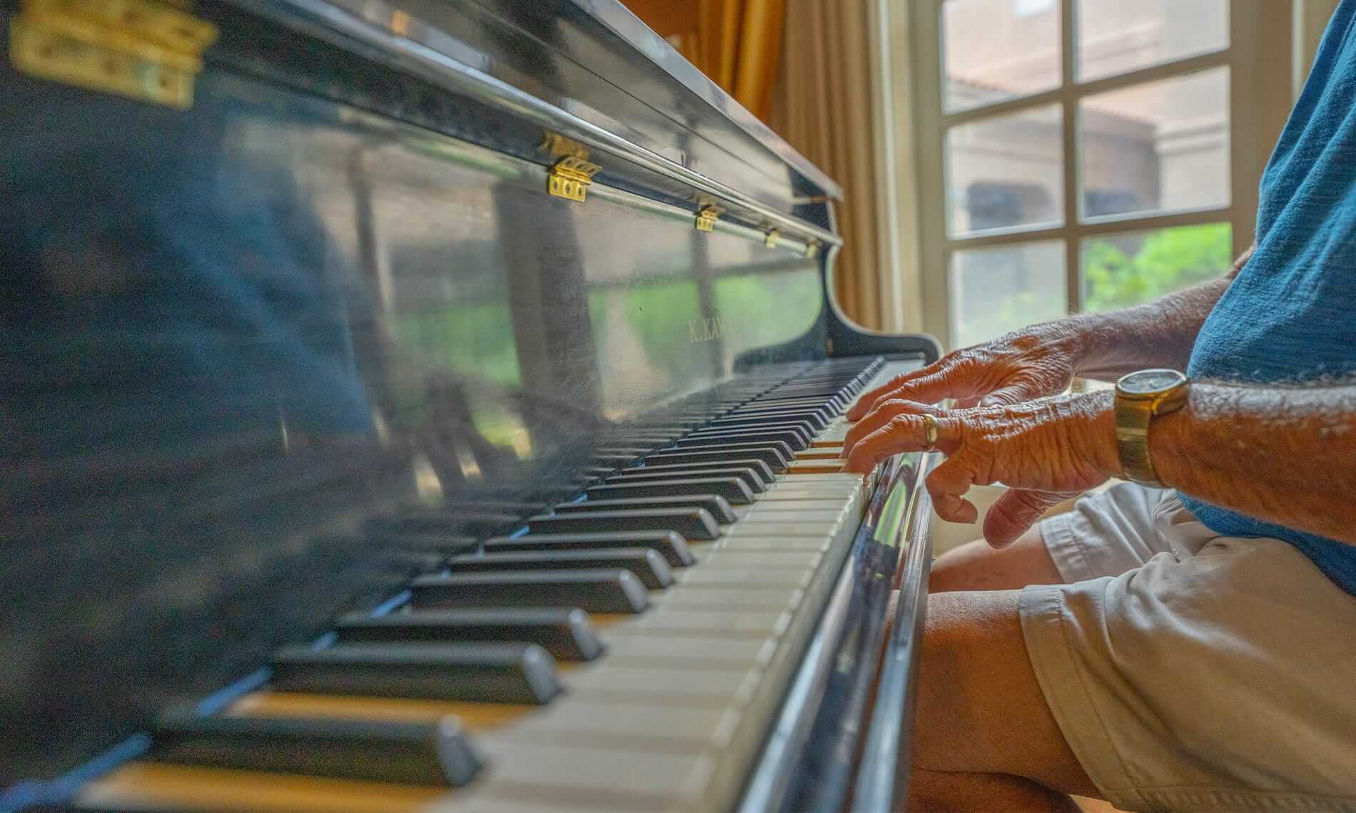 A resident partaking in a Music Therapy Class offered as part of the Wellness program at the Fountains at the Albemarle