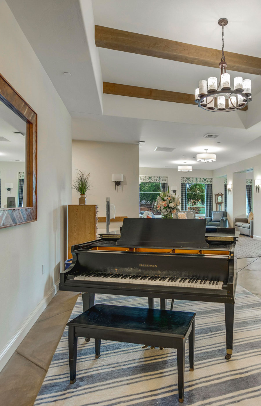 A grand piano in one of the common spaces found at The Hacienda at the River