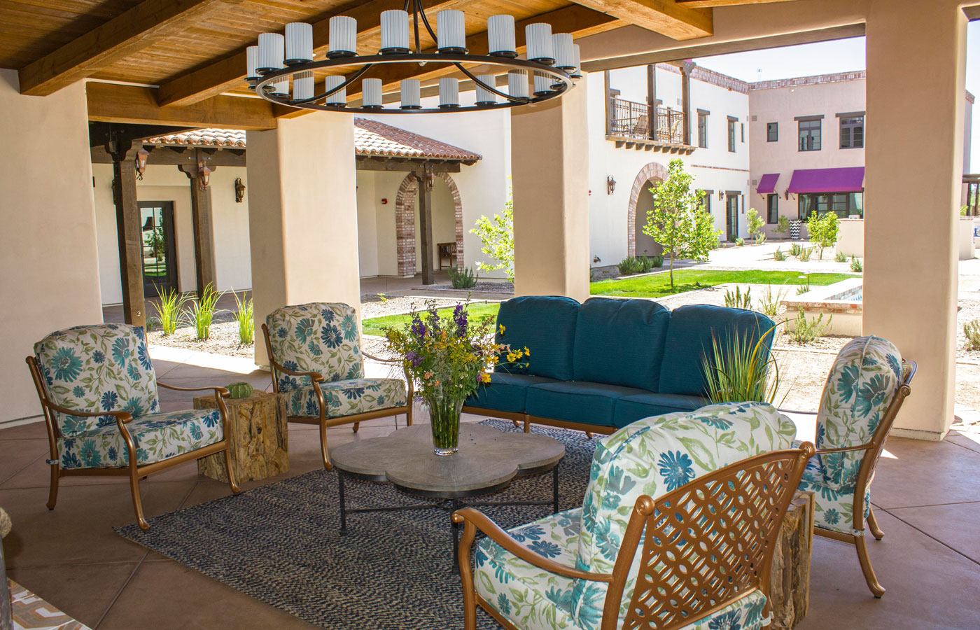 Outdoor seating on one of the covered patios at The Hacienda at the River