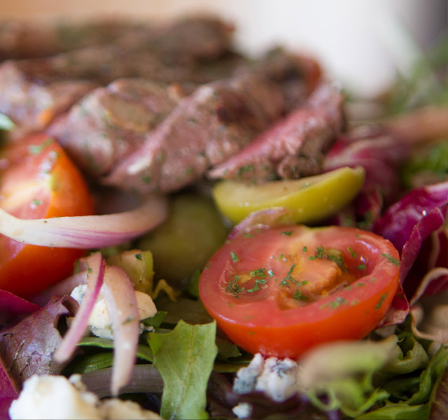 A chef prepared salad at one of the on-site restaurants at The Hacienda at the Rivers
