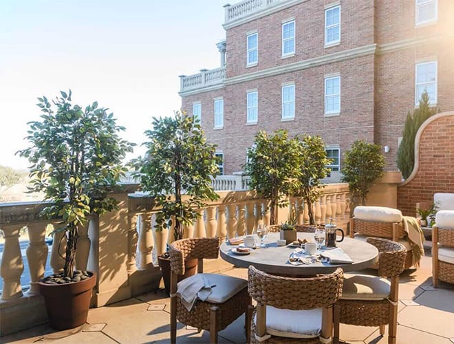 A table set atop the rooftop terrace of the Preston of the Park Cities in Dallas Texas