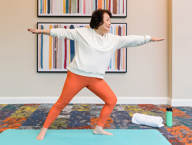 A resident enjoying yoga.