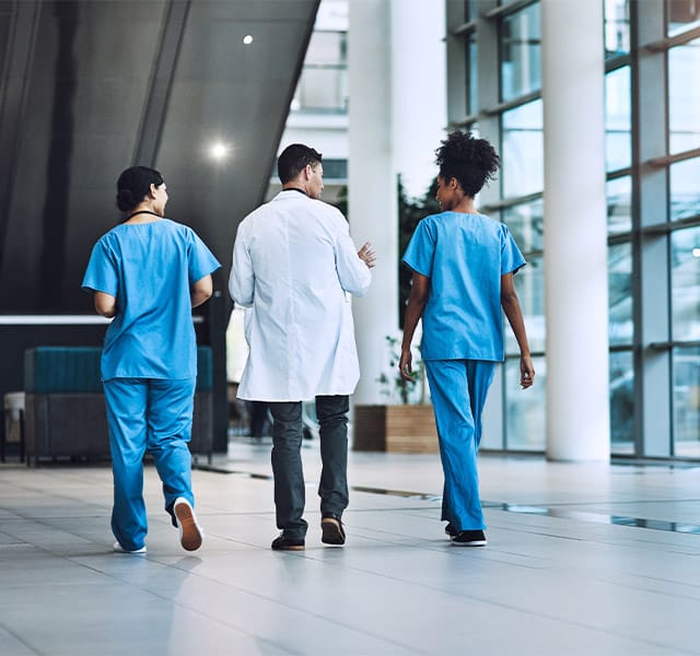 Medical practitioners having a conversation in a hospital