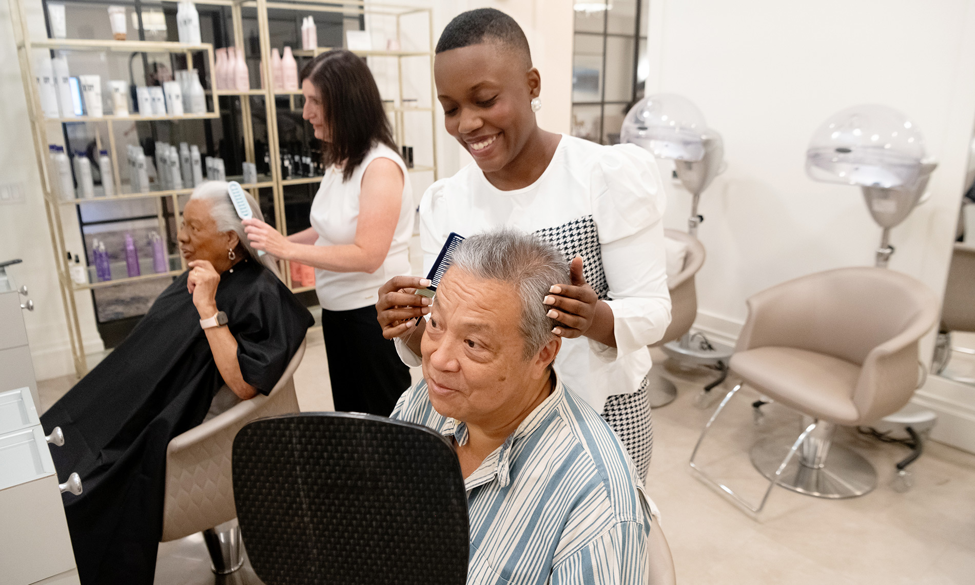 Residents are enjoying a haircut.