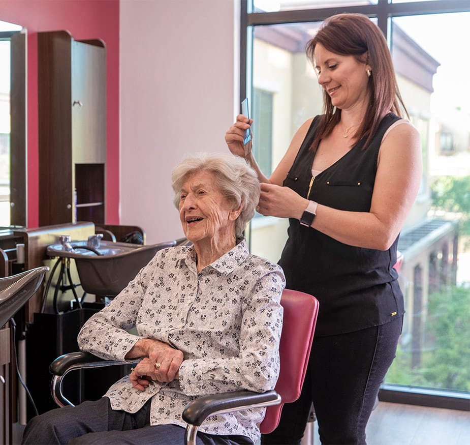 watermark resident getting her hair done