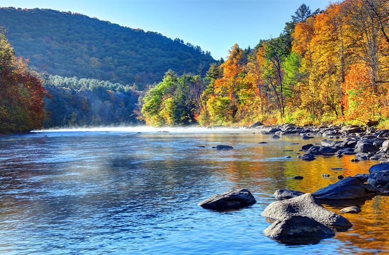 Autumn foliage on the Housatonic River in the Litchfield Hills of Connecticut near Southbury, Ct