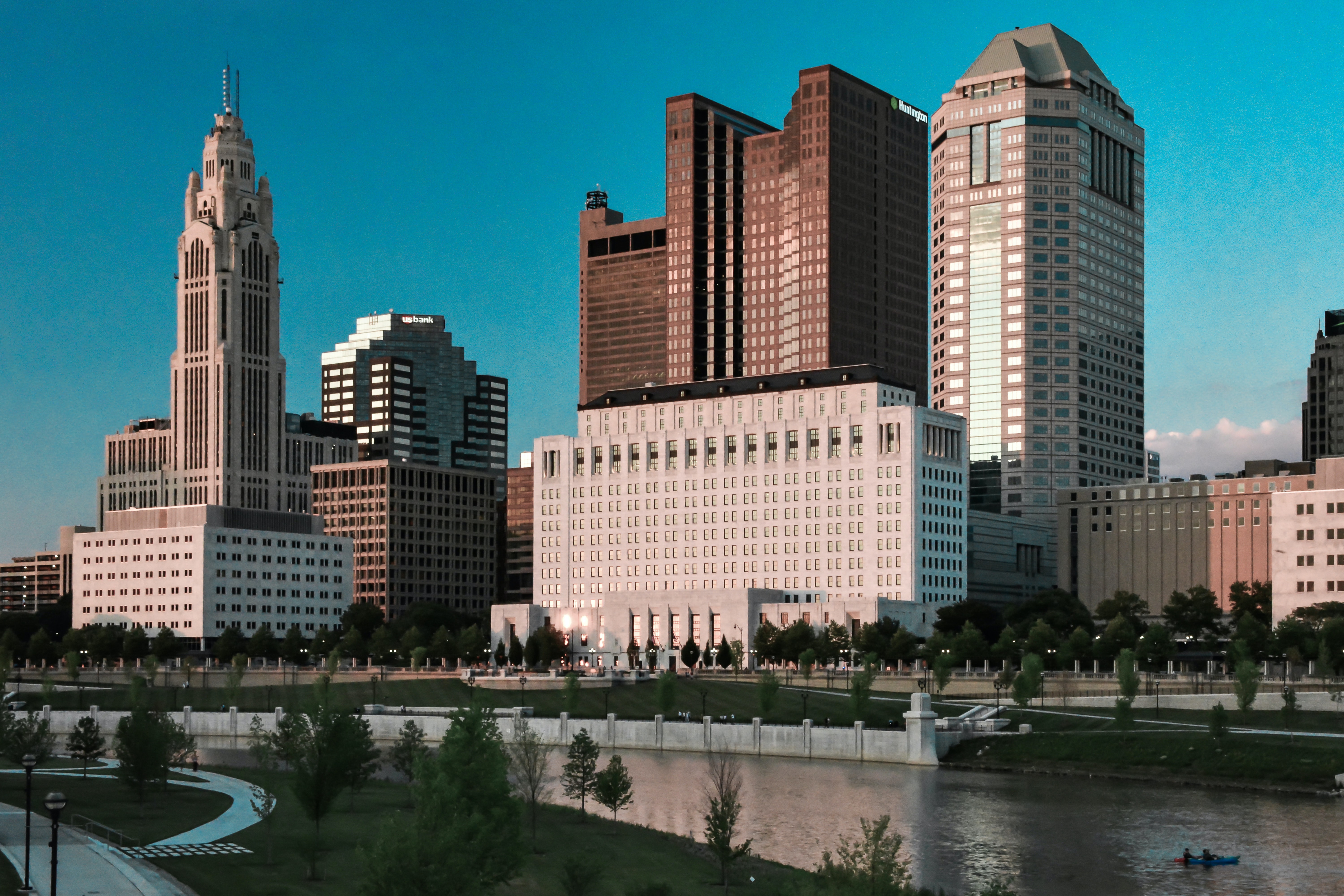 Sky buildings on bank river
