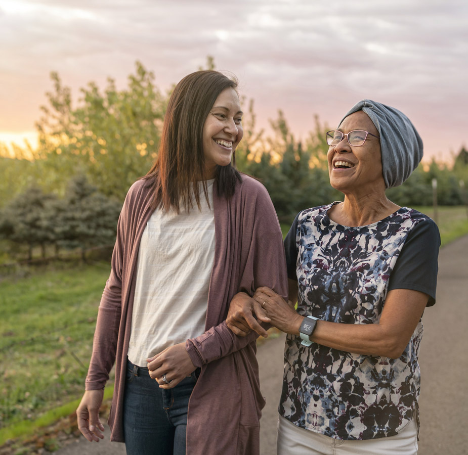 Wellness A lady walking with her daughter outside