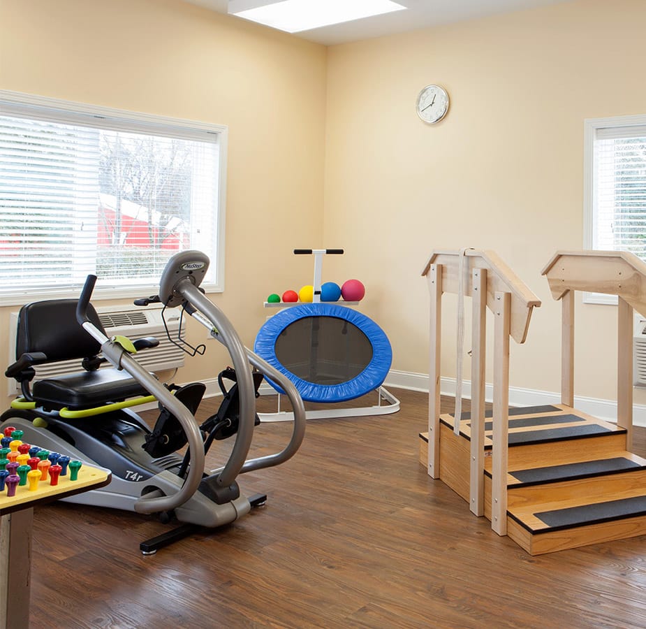 The Fountains at Albemarle Wellness An assortment of fitness equipment including a bike, trampoline and stairs with railing found on-site at the Fountains at Albemarle