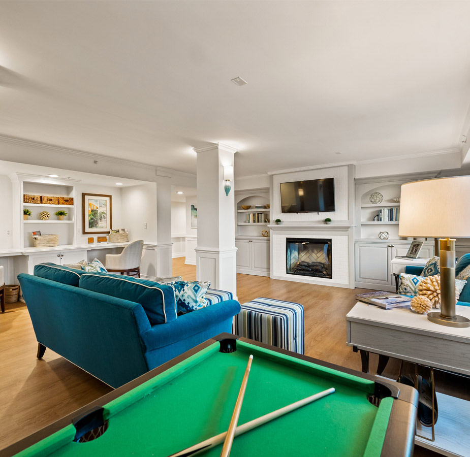 Amenities 2 Amenities room with pool table fireplace and couches