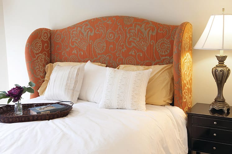 A queen sized bed featured in one of the model units at the Fountains of the Albemarle located in Tarboro, North Carolina
