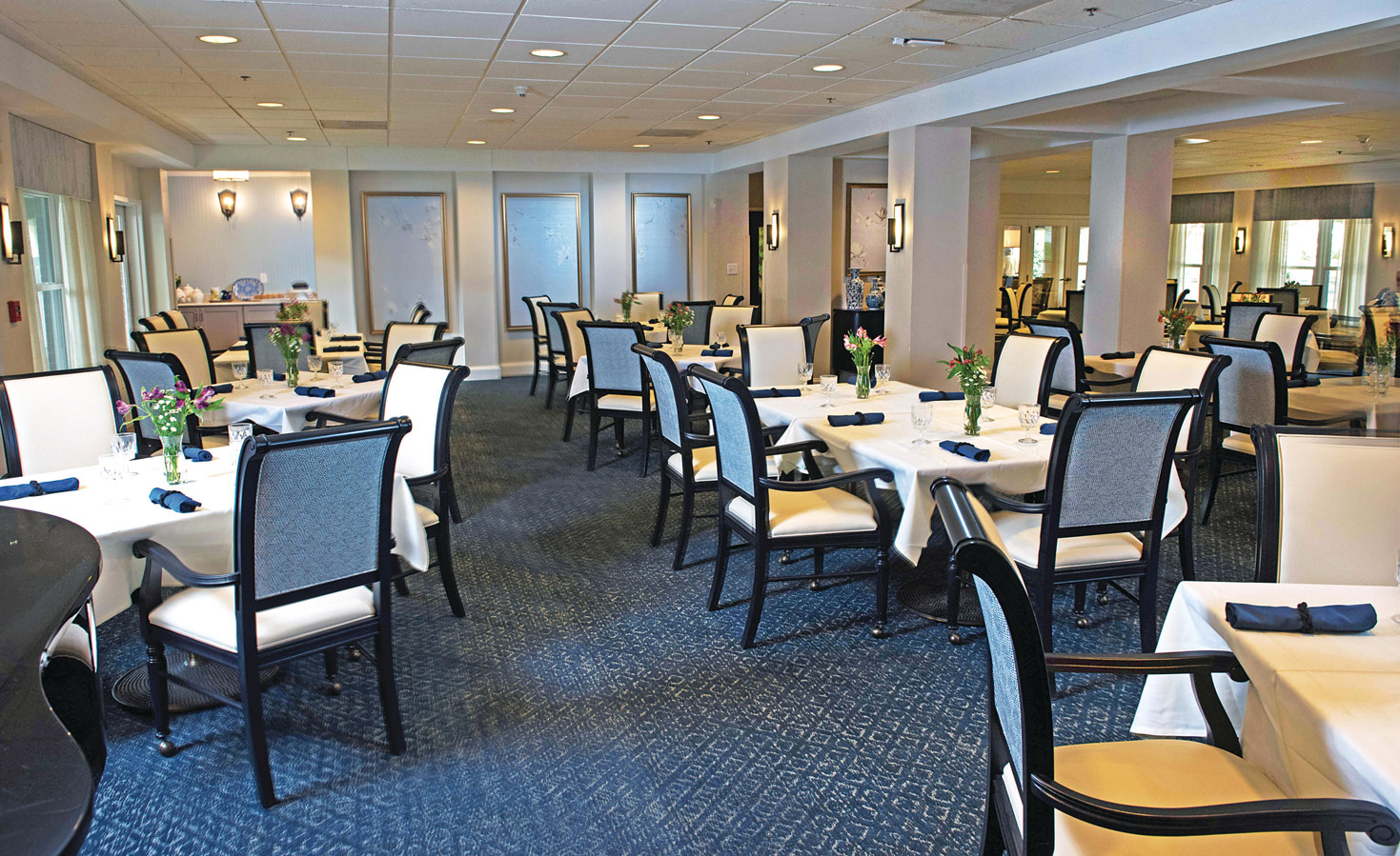 The Fountains at Albemarle A dining room featuring tables with four place seatings