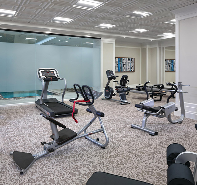 fitness centre showing a variety of equipment