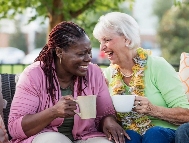 Two residents enjoying coffee together
