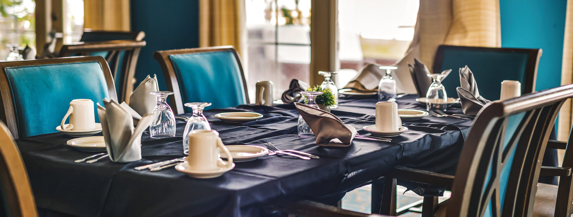 Long dining table beautifully arranged