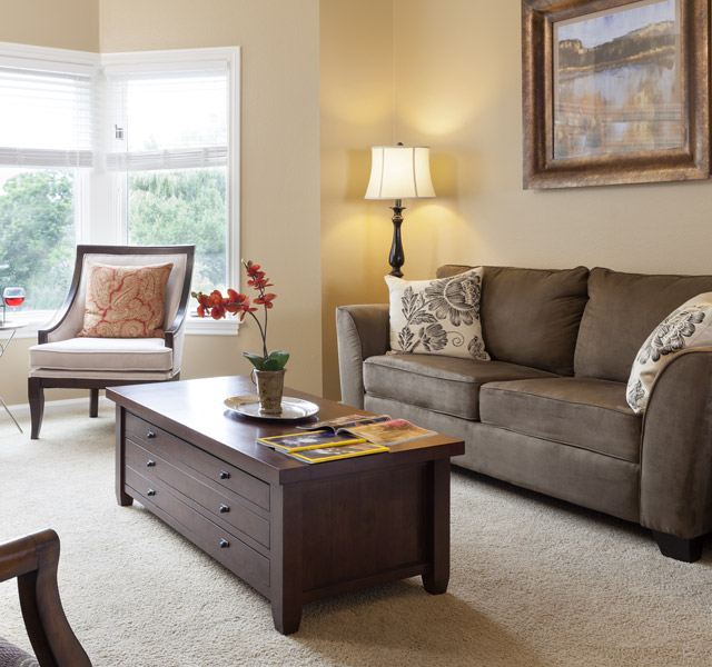 Independent Living room with a couch and chairs