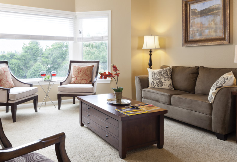 Independent Living room with a couch and chairs