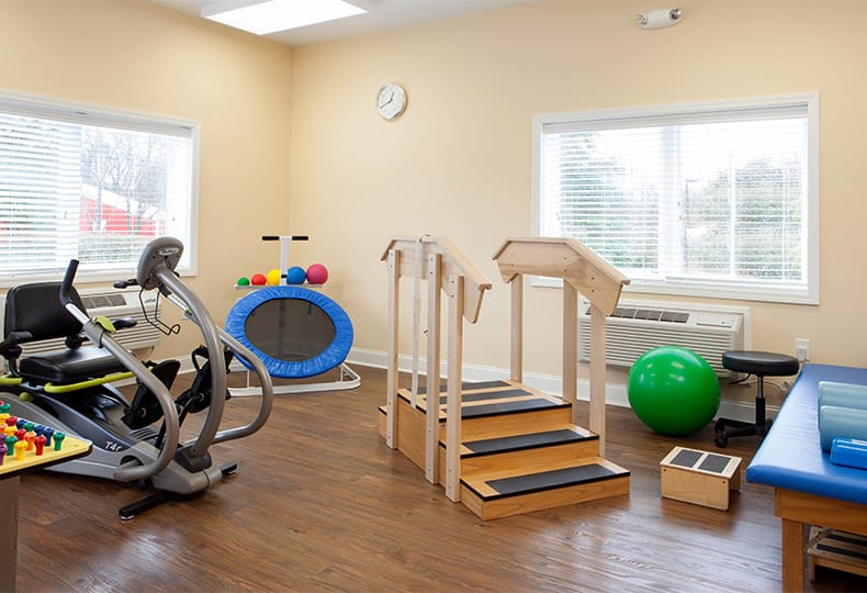 The Fountains at the Albemarle An assortment of fitness equipment including a bike, trampoline and stairs with railing found on-site at the Fountains at Albemarle