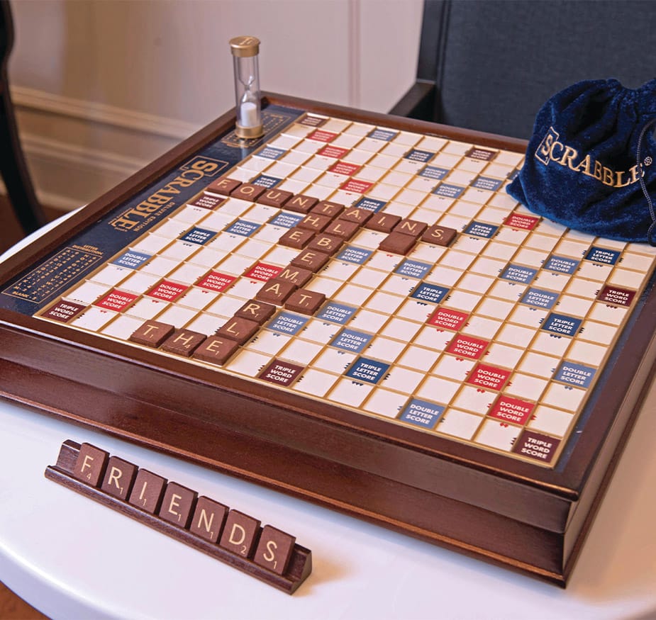 The Fountains at Albemarle A scrabble board sitting atop a table