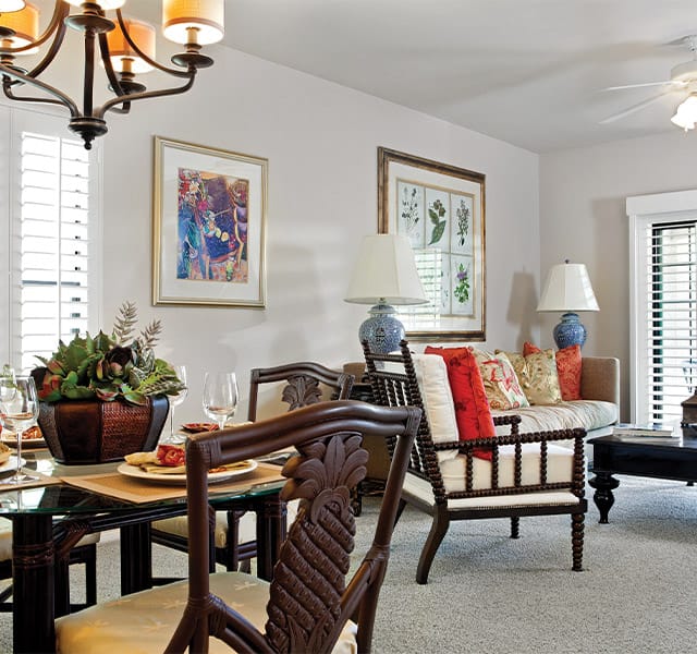 Living room and dining room of a model unit at the Fountains at the Carlotta, Palm Desert, CA