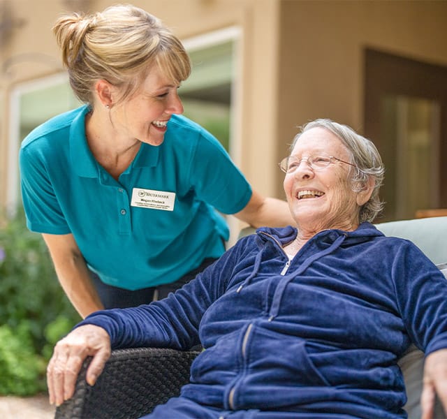 The Preston of the Park Cities Skilled Nurses A nurse and a resident at one of the many properties owned by Watermark Retirement Communities across the United States