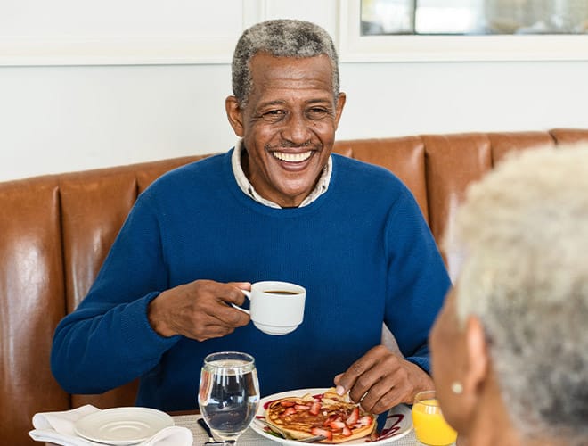 Smiling Man with a coffee cup