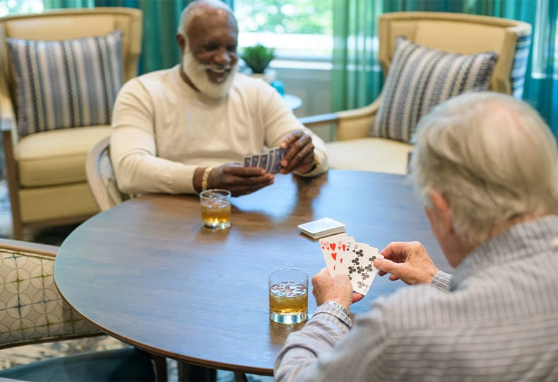 The Fountains at the Albemarle Testimonials Elderly gentleman playing a came of cards