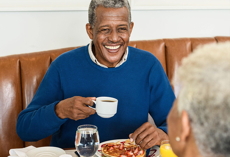 A man with a coffee cup