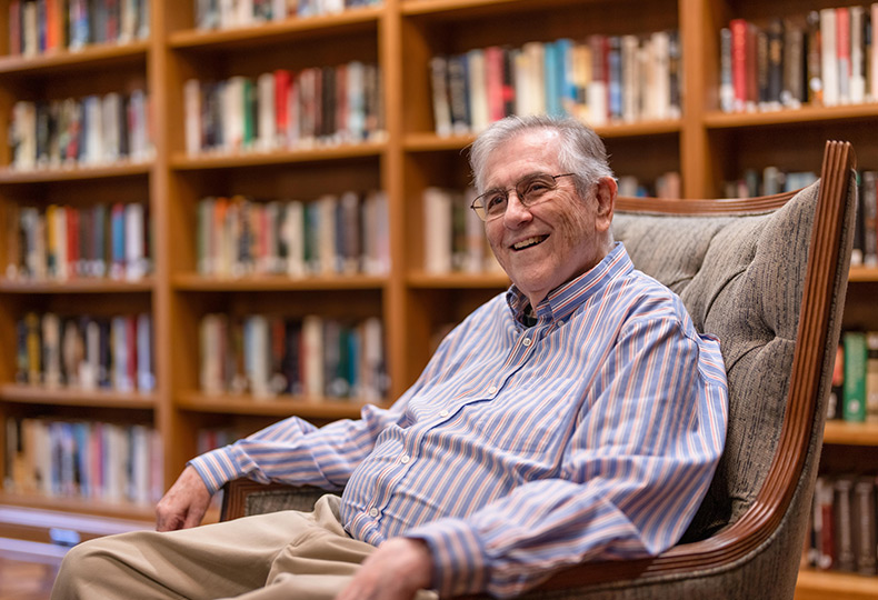 Old Man in a library
