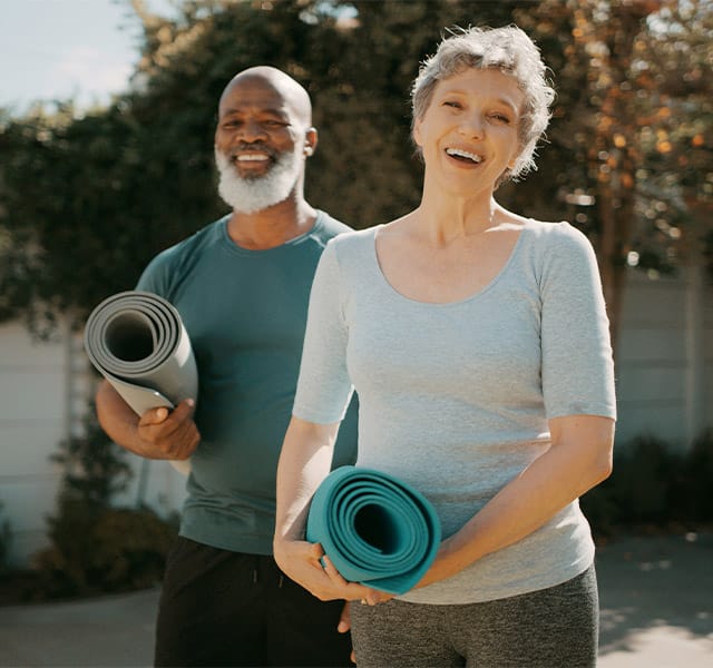 The Hacienda at the River Fitness Residents on their way to enjoy an on-site yoga class as part of the Renew™ Fitness & Wellness program offered at the Hacienda at the River